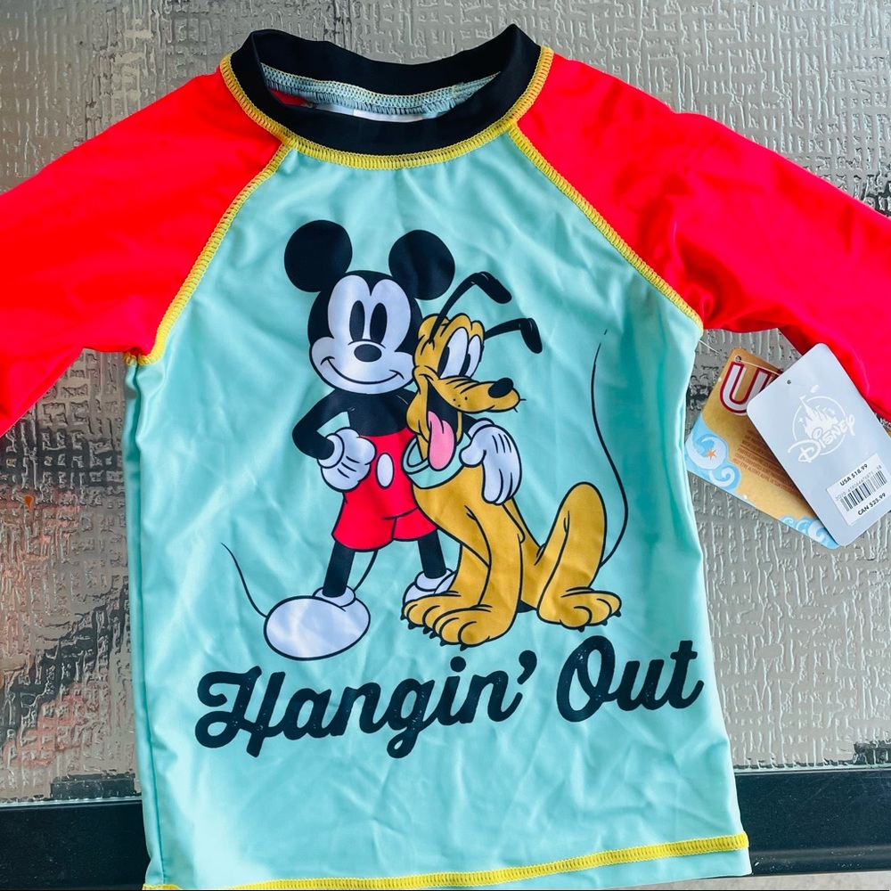 NWT toddler rash guard in size 4.